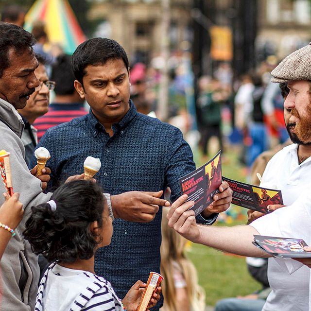 Martyn promotes an event in Bradford's City Park, 2016